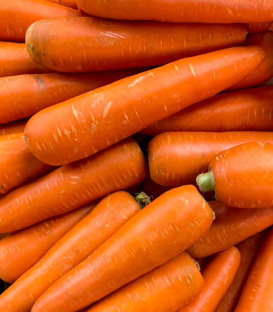 A Heap of Vibrant Orange coloured Carrots